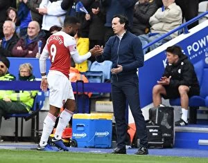 Leicester City v Arsenal 2018-19 Collection: Unai Emery and Alex Lacazette: A Handshake at The King Power Stadium - Leicester City vs