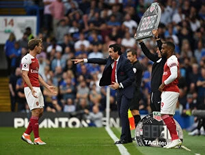 Chelsea v Arsenal 2018-19 Collection: Unai Emery Conferencing with Nacho Monreal during Chelsea vs. Arsenal Premier League Clash (2018-19)