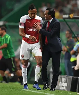 Unai Emery Consults with Aubameyang during Arsenal's Europa League Match