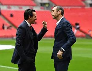 Unai Emery and Martin Keown: A Pre-Match Chat Before the Tottenham-Arsenal Rivalry in the Premier League
