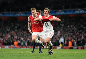 Unforgettable Moment: Arshavin and Bendtner's Euphoric Celebration after Arsenal's Goal vs. Barcelona in the Champions League (2:1, Round 16, 1st Leg)