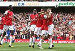 Arsenal v Chelsea 2006-07 Collection: Unforgettable Moment: Gilberto and the Arsenal Team Celebrate a Prideful Goal Against Chelsea
