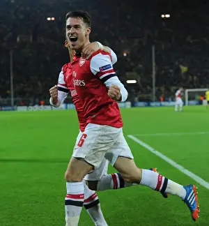 Borussia Dortmund V Arsenal 2013-14 Prints: Unforgettable Moment: Ramsey and Ozil's Goal Celebration - Arsenal at Borussia Dortmund