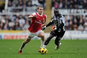 Newcastle United v Arsenal 2010-11 Collection: Unforgettable Rivalry: Wilshere vs. Tiote in the Intense 4-4 Draw between Newcastle and Arsenal