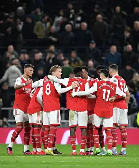 United in Determination: Arsenal's Half-Time Huddle vs. Tottenham Hotspur in the 2022-23 Premier League