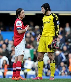 Images Dated 22nd March 2014: United Moment: Rosicky and Cech's Chat Amidst the Chelsea-Arsenal Rivalry (2013-14)