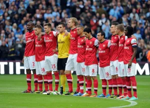 Manchester City V Arsenal 2012:13 Prints: United in Mourning: A Minute's Silence for Manchester's Fallen Heroes - Arsenal vs