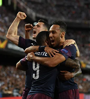 United in Victory: Aubameyang, Lacazette, and Xhaka's Goal Celebration - Arsenal's Europa League Semi-Final Triumph over Valencia