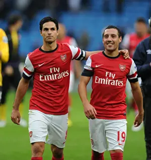 Unity Reigns: Arteta and Cazorla's Post-Match Moment (Manchester City vs. Arsenal, 2012-13)
