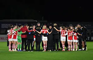 Unity and Victory: Arsenal Women's Champions League Team Celebrates Triumphant Huddle