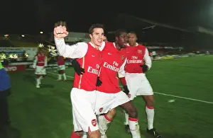 Van Persie, Adebayor, and Baptista: Celebrating a Winning Goal for Arsenal at Vicarage Road (2006)