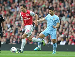 Van Persie Outsmarts Aguero: Thrilling Showdown Between Arsenal and Manchester City (2011-12)