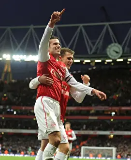 Van Persie and Ramsey: Arsenal's Unstoppable Duo Celebrate First Goal vs. Queens Park Rangers (2011-12)
