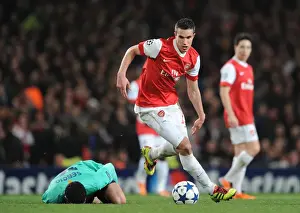 Arsenal V Barcelona 2010-11 Prints: Van Persie vs Busquets: Arsenal's Edge over Barcelona in the 2011 Champions League