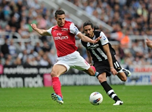 Van Persie vs. Coloccini: A Battle at St. James Park (Newcastle United vs. Arsenal, 2011-12)