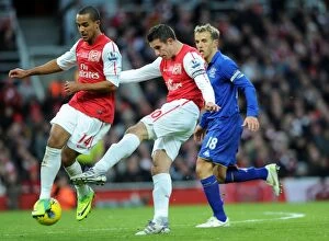 Images Dated 10th December 2011: Van Persie vs. Neville: Intense Moment at the Emirates - Arsenal v Everton, 2011-12