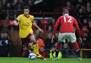 Manchester United v Arsenal FA Cup 2010-11 Collection: Van Persie vs. Smalling: Manchester United's FA Cup Victory over Arsenal (2:0)