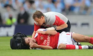 Van Persie's Agony: Manchester Derby Clash with Adebayor