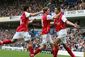 Van Persie's Euphoric Moment: Celebrating with Hleb and Fabregas against Blackburn Rovers