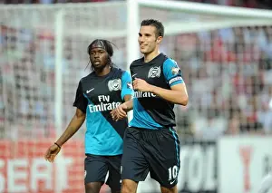 Van Persie's Pre-Season Brilliance: Arsenal's Star Strikers Celebrate Goal Against Benfica (2011)