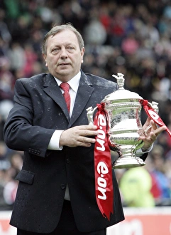Vic Akers the Arsenal Ladies manager with the FA Cup Trophy