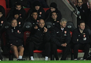 Southampton v Arsenal 2012-13 Collection: Vic Akers, Steve Bould and Arsene Wenger the Arsenal Manager on the bench. Southampton 1: 1 Arsenal