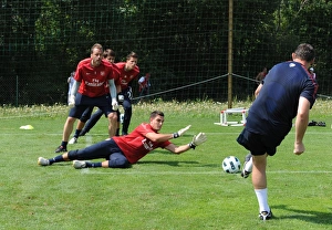 Vito Mannone, Manuel Almunia and goalkeeping coach Tony Roberts. Arsenal Training Camp Vito Mannone, Manuel Almunia and goalkeeping coach Tony Roberts. Arsenal Training Camp