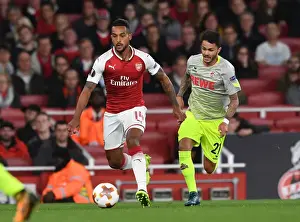 Arsenal V FC Köln 2017-18 Prints: Walcott vs. Bittencourt: A Football Rivalry Erupts in the Arsenal vs