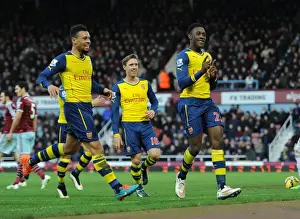 Welbeck and Coquelin Celebrate Arsenal's Victory: West Ham United vs Arsenal (2014-15)