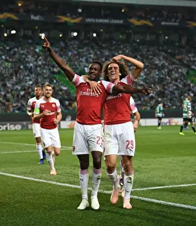 Sporting Lisbon V Arsenal 2018-19 Prints: Welbeck and Guendouzi Celebrate Arsenal's Goal Against Sporting CP in Europa League