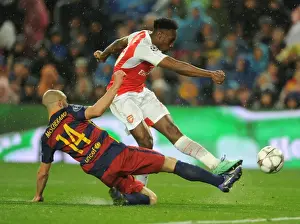 Welbeck vs. Mascherano: A Tense Shooting Showdown in the Barcelona vs. Arsenal UEFA Champions League Clash