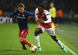CSKA Moscow V Arsenal 2017-18 Prints: Welbeck vs. Nababkin: Arsenal's Battle in the Europa League Quarterfinals against CSKA Moscow