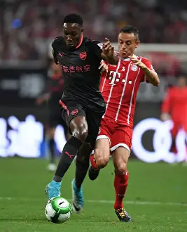 Bayern Munich V Arsenal 2017-18 Prints: Welbeck vs Rafinha: Arsenal vs Bayern Munich Pre-Season Showdown (2017)