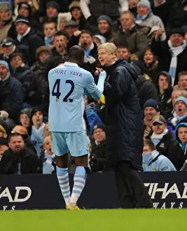 Manchester City V Arsenal 2011-12 Prints: Wenger and Toure: A Light-Hearted Moment Amidst the Manchester Rivalry (2011-12)
