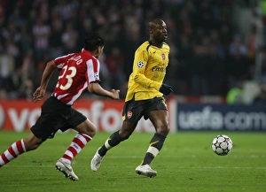 Images Dated 23rd February 2007: William Gallas (Arsenal) Carlos Salcido (PSV)