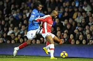 Portsmouth v Arsenal 2009-10 Collection: William Gallas (Arsenal) Frederic Piquionne (Portsmouth). Portsmouth 1: 4 Arsenal