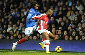 Portsmouth V Arsenal 2009-10 Prints: William Gallas (Arsenal) Frederic Piquionne (Portsmouth). Portsmouth 1: 4 Arsenal