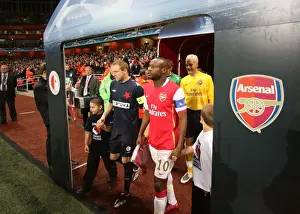 William Gallas (Arsenal) Stanislav Vlcek (Slavia) walk out before the match