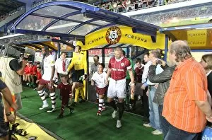 William Gallas and Tomas Repka lead out the teams before the match