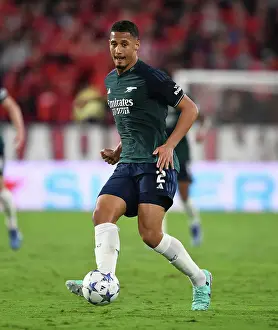 Sevilla V Arsenal 2023-24 Prints: William Saliba's Debut: Arsenal Tackles Sevilla in Champions League (2023-24)