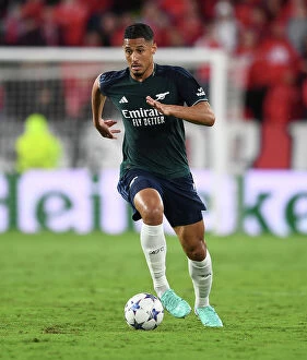 Images Dated 25th October 2023: William Saliba's Determined Performance: Arsenal Holds Strong Against Sevilla in Champions League