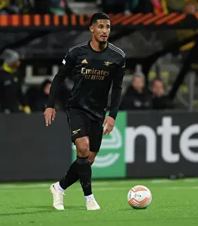 Bodø/Glimt V Arsenal 2022-23 Prints: William Saliba's Standout Performance: Arsenal's Defender Dazzles in Europa League Victory over Bodø/Glimt