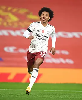Willian at Empty Old Trafford: Premier League Showdown Amidst COVID-19 Restrictions (2020-21)