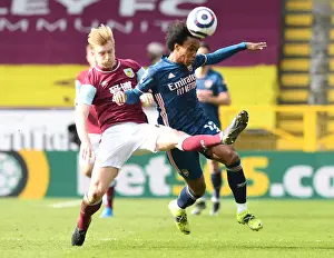 Willian vs Ben Mee: Premier League Showdown at Empty Turf Moor (Burnley vs Arsenal, March 2021)