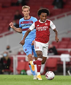 Arsenal v West Ham United 2020-21 Collection: Willian vs. Soucek Showdown: Arsenal vs. West Ham United Premier League Clash