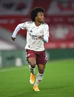 Willian's Silent Struggle: Arsenal vs. Liverpool at Anfield in the 2020-21 Premier League