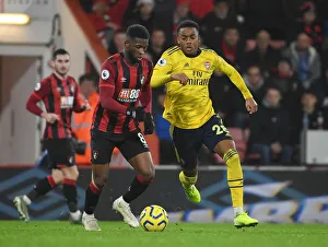 Willock vs. Lerma: A Premier League Battle - Arsenal's Joe Willock Clashes with Bournemouth's Jefferson Lerma