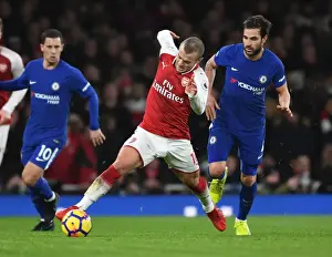 Wilshere Outsmarts Fabregas: Epic Battle Between Former Arsenal Teammates in Premier League Clash