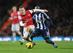 Images Dated 8th December 2012: Wilshere vs. Mulumbu: Foul Incident - Arsenal vs. West Bromwich Albion (2012-13)