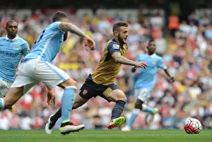 Manchester City V Arsenal 2105-16 Prints: Wilshere vs. Otamendi: A Premier League Showdown at the Manchester Derby (May 2016)